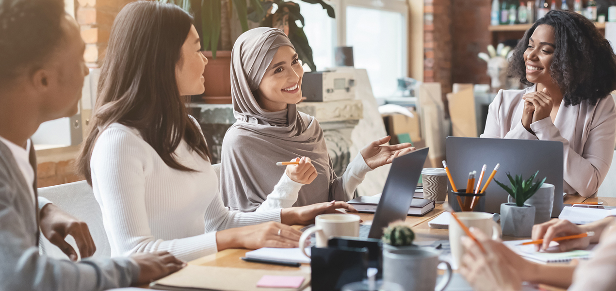 Group of people with diverse backgrounds having a meeting.